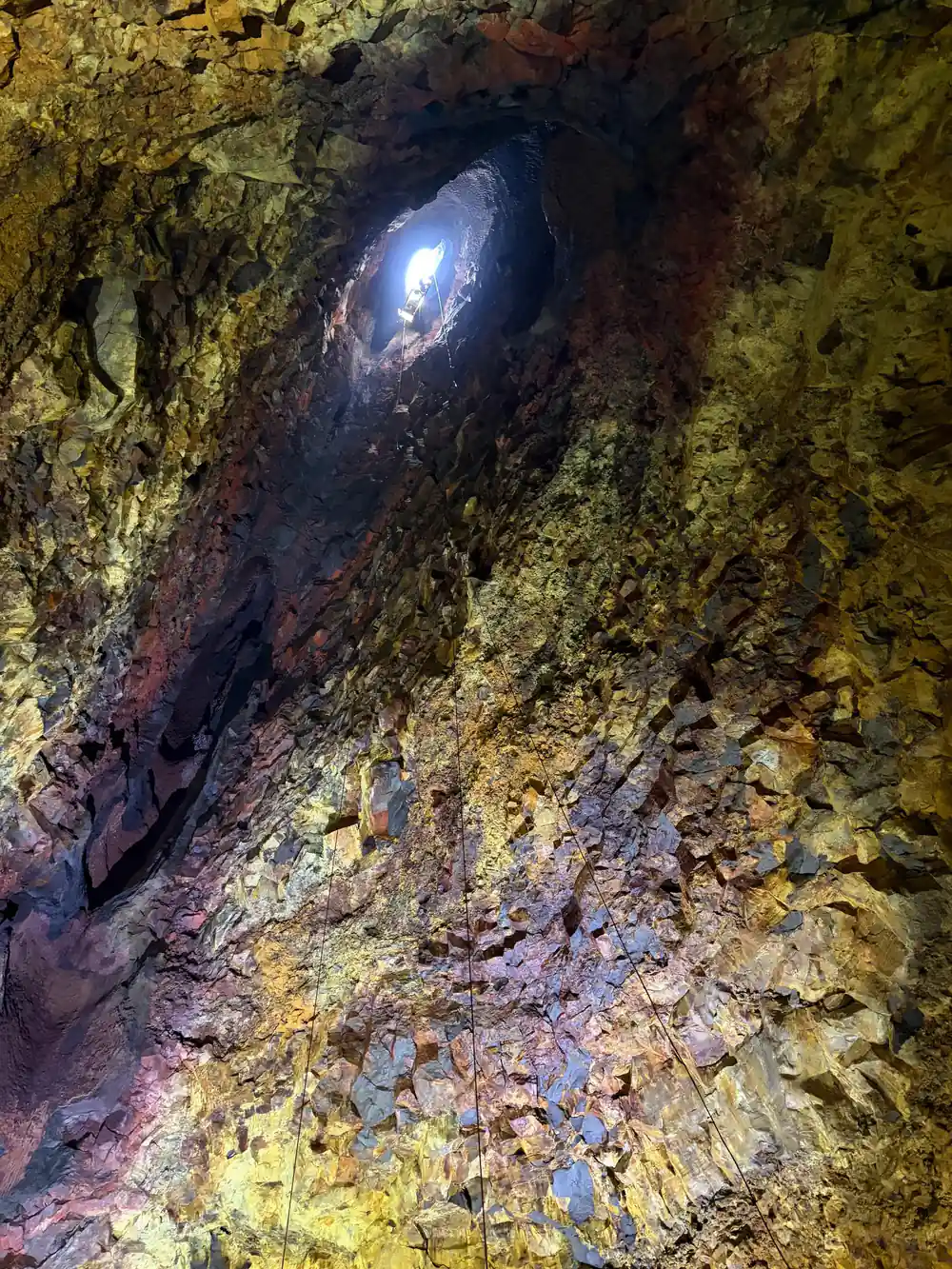 A lamp in a hollow with the wall gold around it