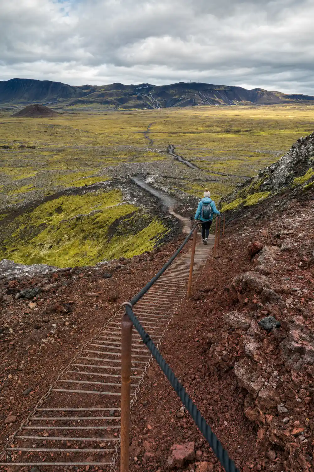 The stepped path climbing the red scoria of the cone